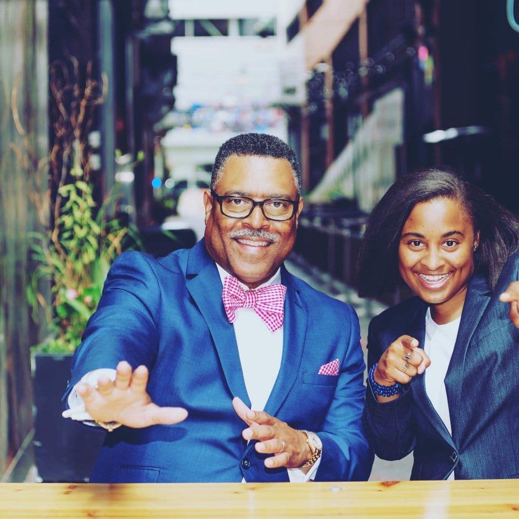 Attorney Arnold Reed posing with his daughter