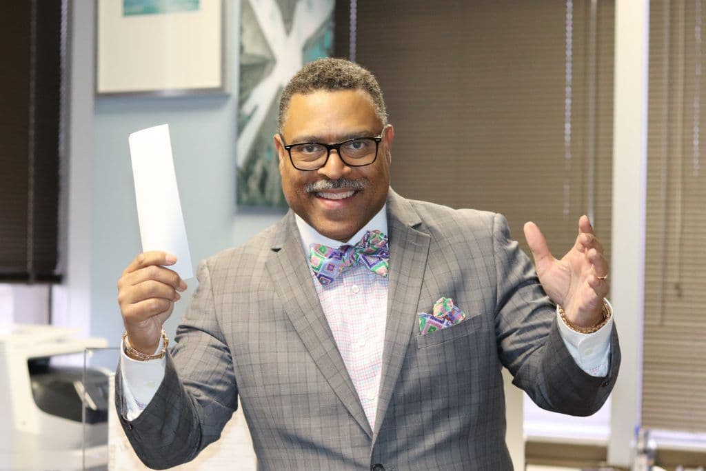 Attorney Arnold Reed Posing with joyous candor for a photo