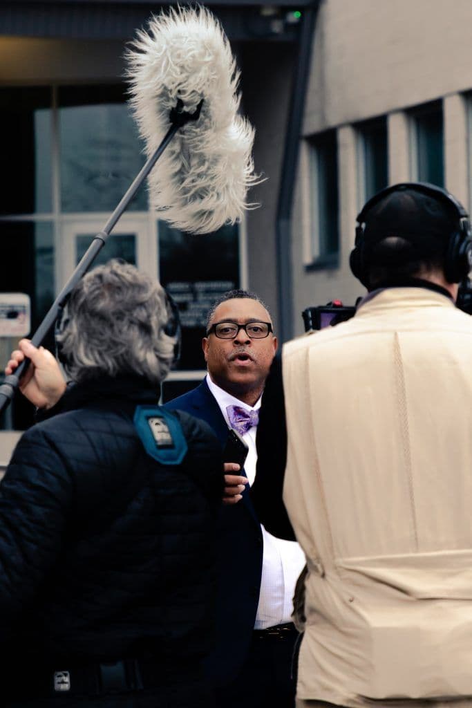 Attorney Arnold Reed speaking to a crowd of reporters
